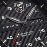 Close up of Luminox Watch with a black textured face