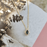 Bluebird™ London Blue Topaz & Diamond Marquise Halo Pendant with Chain in 9ct Yellow Gold