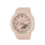 Casio G-Shock GMAS2100-4A watch front view, featuring a 46.2mm blush pink octagonal Carbon Core Guard resin case with a flat dial, rose gold-toned mirror bar indices, analogue hands with Neobrite lume, day sub-dial at 9 o'clock, and lower digital LCD display window.