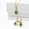 Emerald & Diamond Twist Pear Shape Pendant in 9ct Yellow Gold