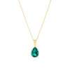 A 9ct yellow gold pendant shown front on, featuring an 8x6mm created emerald in a pear cut, claw set and suspended from a bale. Styled as a May birthstone gift.