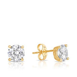 A pair of 9ct yellow gold stud earrings shown front on, featuring a 6.5mm round cubic zirconia gemstone with a bright, brilliant shine. Secured with a butterfly back for a classic, everyday-ready finish.