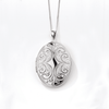 Embossed Oval Locket Pendant in Sterling Silver