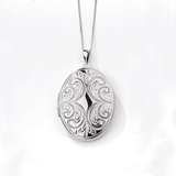 Embossed Oval Locket Pendant in Sterling Silver