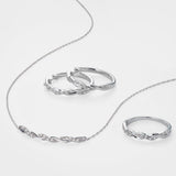 Diamond and Sterling Silver Twist Huggie Earrings