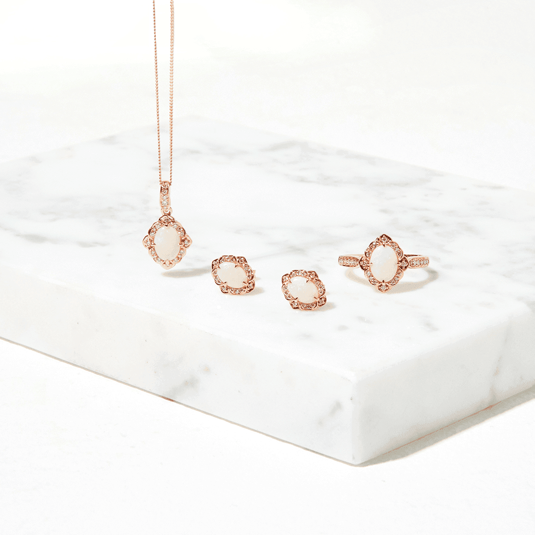 Opal and Diamond Oval Earrings in 9ct Rose Gold
