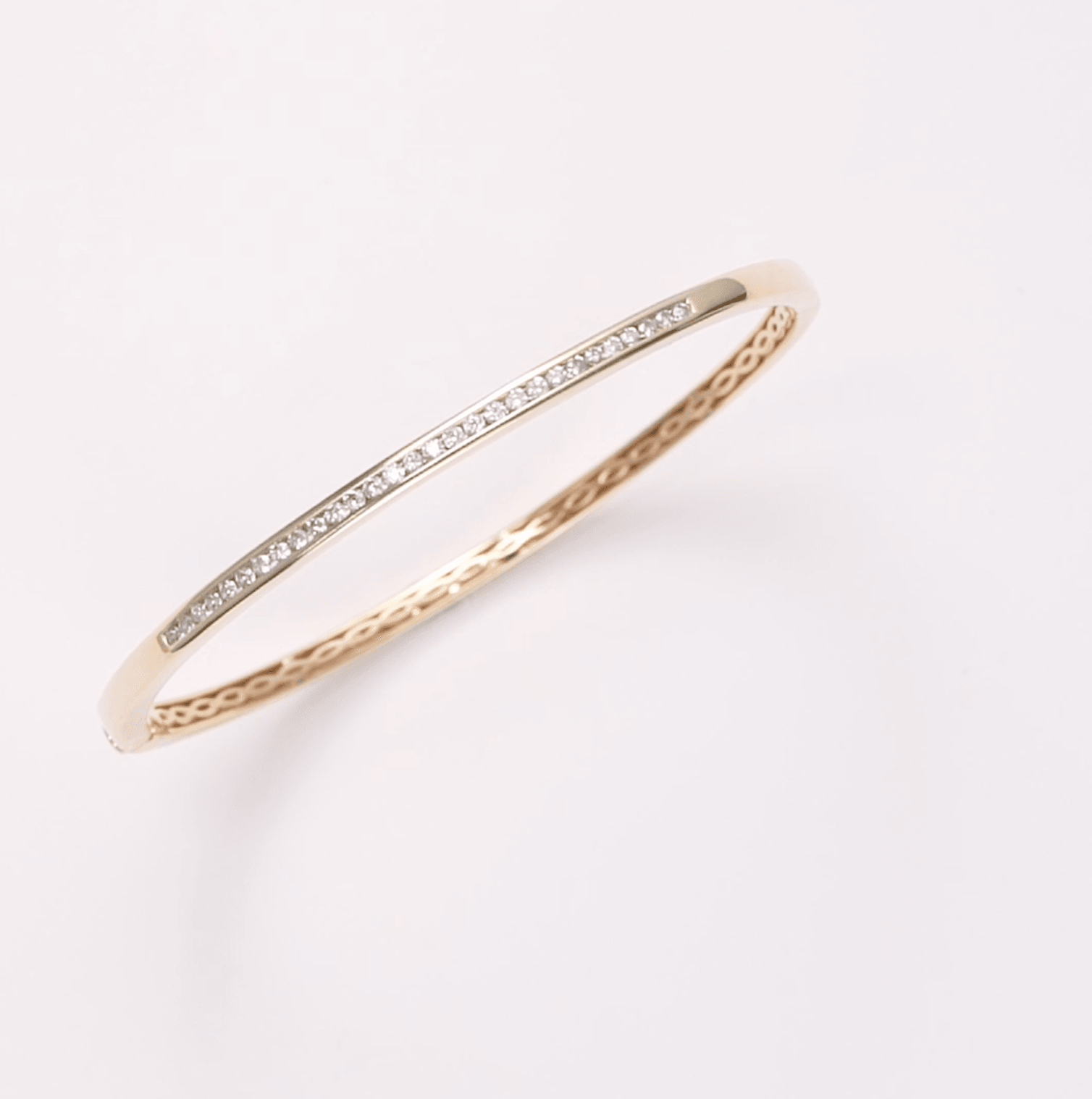 Round Brilliant Cut Channel Set Diamond Oval Bangle in 9ct Yellow Gold - Wallace Bishop