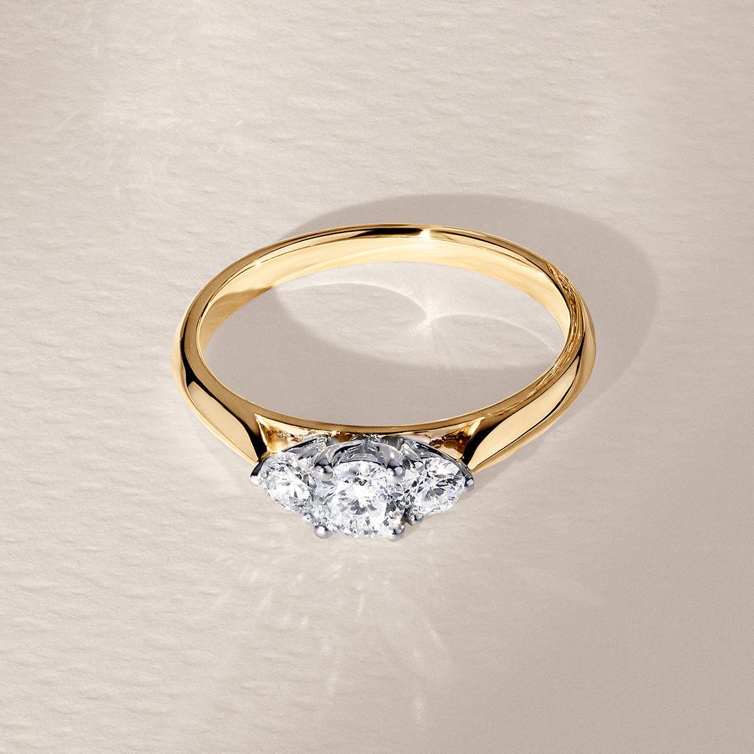 0.50ct TW Round Brilliant Cut Three Stone Diamond Engagement Ring in 18ct Yellow and White Gold
