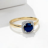Sapphire & Diamond Halo Ring in Yellow Gold
