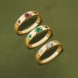 Three Gold Bands with Gemstones