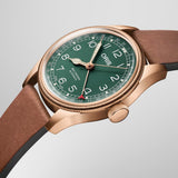 Side profile of the Oris Big Crown Limited Edition Men's 40mm Bronze Automatic Watch 754 7741 3167LS, showing the case depth and domed sapphire crystal. The brown leather strap and polished bronze bezel are visible along the watch's profile.