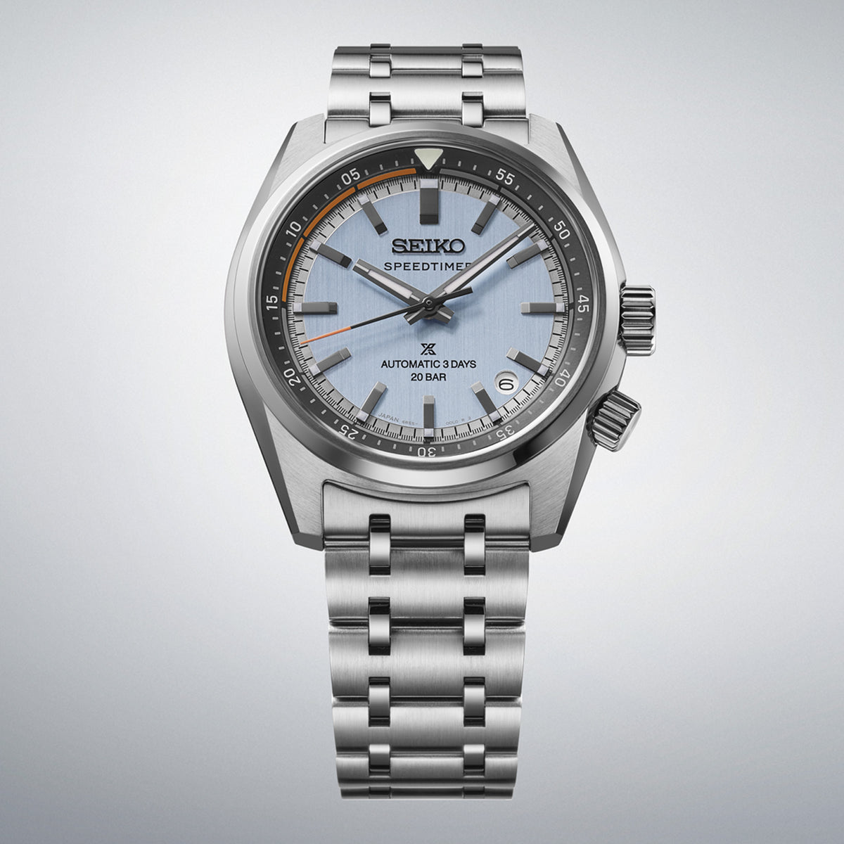 From this angle, the Seiko Prospex Speedtimer Men’s 39.50mm Watch HBC003J shows the light blue dial, orange accent ring and rotating countdown scale together with the steel bracelet.