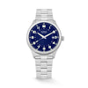 The Loyal Adventurer Field Watch features a blue dial with luminous hands and markers, framed by a stainless steel case, reference 05C97MBA1. This 40mm quartz watch pairs a stainless steel bracelet with a single-domed sapphire crystal and 100m water resistance.