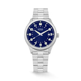 The Loyal Adventurer Field Watch features a blue dial with luminous hands and markers, framed by a stainless steel case, reference 05C97MBA1. This 40mm quartz watch pairs a stainless steel bracelet with a single-domed sapphire crystal and 100m water resistance.