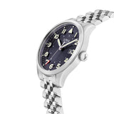Three-quarter angle view of the Loyal Adventurer Pilot Watch, reference 05C96MB01, showing the case profile and stainless steel bracelet construction. The 40mm case and 12 o'clock orientation triangle are visible from this angle, alongside the bonus black leather strap included with this set.