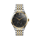 The Timex Waterbury Traditional Quartz 39mm Watch TW2Y91900 features a textured black dial with a pronounced gold-tone handset and matching hour markers. A sub-second dial sits at 6 o'clock.