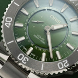 Oris Aquis Dat Watt Limited Edition II Men’s Automatic 43.50mm Watch 743 7734 4197-SET, close up of the green dial, small seconds at 9 o’clock and circular date display.