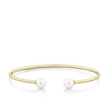 Front-on view of the Wallace Bishop Freshwater Pearl Flexi Bangle in 9ct Yellow Gold, reference 33BGPBY, measuring 50 x 60mm. A 7mm round white freshwater pearl sits at each end of the open cuff-style bangle.