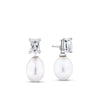 Front-on view of the Wallace Bishop Freshwater Pearl & Cubic Zirconia Drop Earrings in Sterling Silver, reference 33ECZ02, with butterfly backs. Each earring has an 8-9mm white rice shaped freshwater pearl hanging from an emerald cut colourless cubic zirconia.