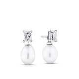 Front-on view of the Wallace Bishop Freshwater Pearl & Cubic Zirconia Drop Earrings in Sterling Silver, reference 33ECZ02, with butterfly backs. Each earring has an 8-9mm white rice shaped freshwater pearl hanging from an emerald cut colourless cubic zirconia.