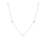 Front-on view of the Wallace Bishop Freshwater Pearl & Cubic Zirconia Bezel Necklace in 9ct Yellow Gold, reference 33PDCZ06Y, on a cable style link chain with a parrot clasp. The necklace features a station-set design with four round freshwater pearls and four round cubic zirconias.