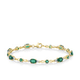Front-on view of the Wallace Bishop 0.06 TDW Created Emerald & Diamond Bracelet in 9ct Yellow Gold, reference 34BLE16, 180mm in length with a lobster clasp. Green oval and round created emeralds alternate along the polished gold links, with small round diamonds between them.