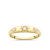 Front-on view of the Wallace Bishop Opal Starburst Ring in 9ct Yellow Gold, reference 36RGSBOYO. Three round opals sit in a star hammer setting across the front of the tapered gold ring.