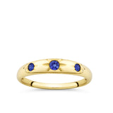 Front-on view of the Wallace Bishop Created Sapphire Starburst Ring in 9ct Yellow Gold, reference 38RGSBSYO. Three round created blue sapphires sit in a star hammer setting across the front of the tapered gold ring.