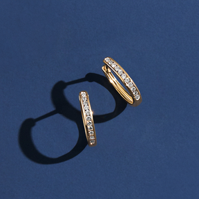 0.25ct TW Channel Set Diamond Oval Huggie in 9ct Yellow Gold