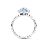 1917™ aquamarine and 0.52ct TW diamond halo engagement ring in 18ct white gold, photographed side on.