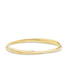 Front-on view of the Wallace Bishop Interlocking Patterned Bangle in 9ct Yellow Gold, reference 45BG228Y, with a round, polished silhouette. The bangle features an interlocking pattern design in a fine, lightweight 2.8mm width.