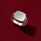 Front-on view of the Wallace Bishop Gents Signet Ring in Sterling Silver, reference 49RRP002V. The men’s signet ring features a polished cushion-shaped face with rope detailing on the shoulders.