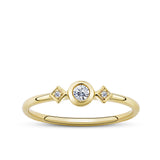 Front-on view of the Wallace Bishop Cubic Zirconia Trilogy Ring in 9ct Yellow Gold, reference 68RCZ18Y, on a petite polished gold band. The ring features a bezel-set round cubic zirconia centre stone flanked by two smaller claw-set cubic zirconias, forming a trilogy design in yellow gold.