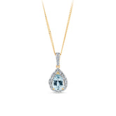 Topaz &  0.14ct TW Diamond Halo Pendant in 9ct Yellow Gold