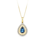 Front-on view of the Wallace Bishop 0.15 TDW Topaz & Diamond Bezel Pendant in 9ct Yellow Gold, reference 93PDLBT015Y, measuring 34mm in length including the bale. The filigree-style pendant features a bezel-set 12x8mm pear-cut blue topaz surrounded by a border of natural round diamonds.