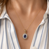 Tanzanite & Diamond Double Halo Pendant in 9ct Yellow and White Gold