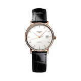 Longines watch with black leather strap and white dial with a diamond bezel