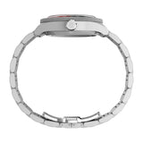 side profile - Timex Waterbury Heritage Automatic GMT men’s watch with black dial, stainless steel bracelet, and stainless steel case featuring a rotating bezel and GMT hand for dual time zone tracking in a classic heritage design.