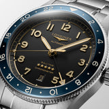 Longines watch with black dial and blue bezel