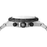 TAG Heuer Formula 1 Chronograph CAZ1010.BA0842 photographed from a side profile, showing the case thickness and screw-down crown. The steel bracelet and tachymeter bezel are visible together in frame.