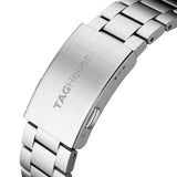 TAG Heuer Formula 1 Date WAZ1110.BA0875 photographed in close-up focusing on the steel bracelet's polished and brushed link detailing. The case is partially visible at the top of the frame, connecting to the bracelet via the lugs.