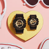 Casio Baby-G BA110X-1A women's watch front view, featuring a 46.3mm all-black round resin case with a deeply layered three-dimensional dial, gear-inspired index markings, analogue hands, and a lower digital LCD display window.