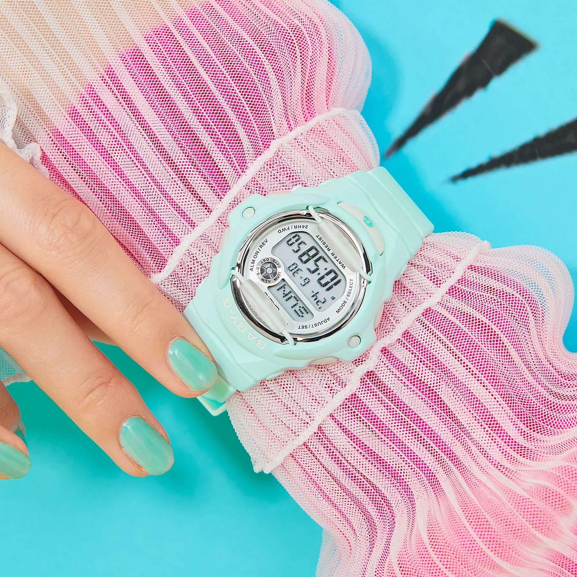 Casio BABY-G BG169U-3D digital watch with green resin band, compact round case, and shock-resistant sporty design on hand