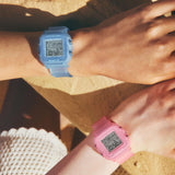 The Casio Baby-G BGD10KG-2D and BGD10KG-4D reveals the sparkling embedded glitter detail across the translucent blue resin case and band, and the retro pixel-art LCD animation display in close detail.