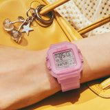 Worn on the wrist, the Casio Baby-G BGD10KG-4D demonstrates the compact, lightweight square translucent pink glitter case — a playful Y2K-inspired accessory for everyday and active wear.
