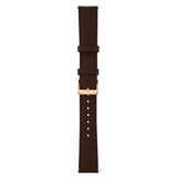 A dark brown leather watch strap with a polished gold-tone buckle, shown vertically against a plain white background.