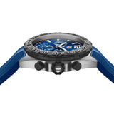 TAG Heuer Formula 1 Chronograph CAZ101AV.FT8077 photographed from a side profile, showing the case thickness and screw-down crown. The blue rubber strap and tachymeter bezel are visible together in frame.