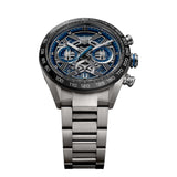 TAG Heuer Carrera Chronograph Extreme Sport CBU2081.BF0007 shown at an angle combining the openworked dial, black ceramic bezel, and titanium case in one frame. The blue counter accents catch the light against the skeletonized dial surface.
