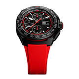 TAG Heuer Formula 1 Chronograph CBZ2085.FT8093 photographed at an angle highlighting the black dial's chronograph subdials and black DLC bezel. The red rubber strap curves away from the lugs, showing its textured finish.