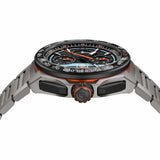 TAG Heuer Formula 1 Chronograph x Gulf CBZ208B.BF0009 photographed from a side profile, showing the case thickness and black DLC-coated screw-down crown. The titanium bracelet and forged carbon bezel are visible together in frame.